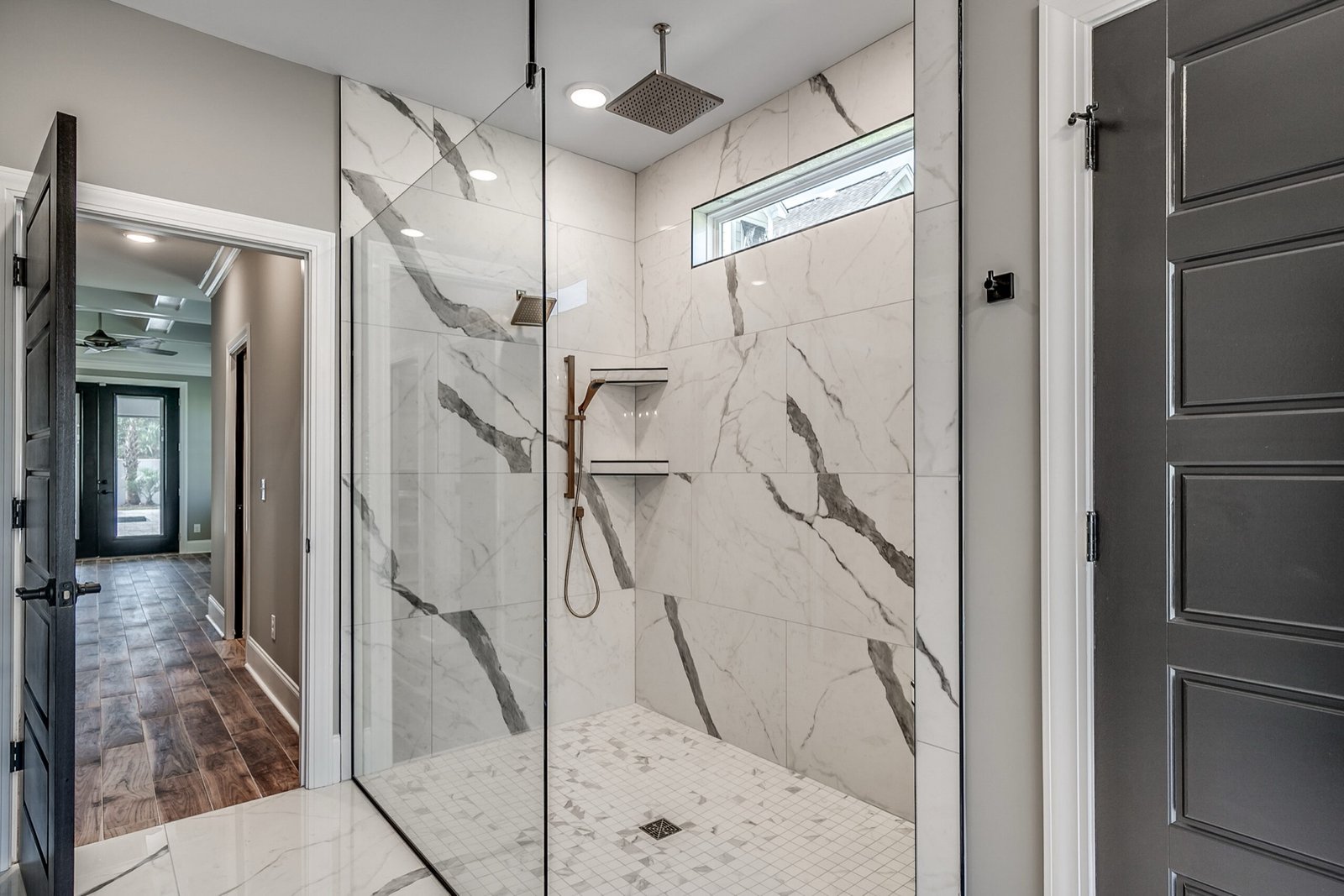 Marble walk-in shower at 849 Bluffview