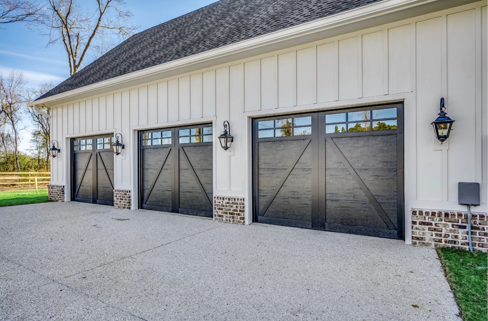 Detached garage with custom carriage doors at 3751 Highway 319
