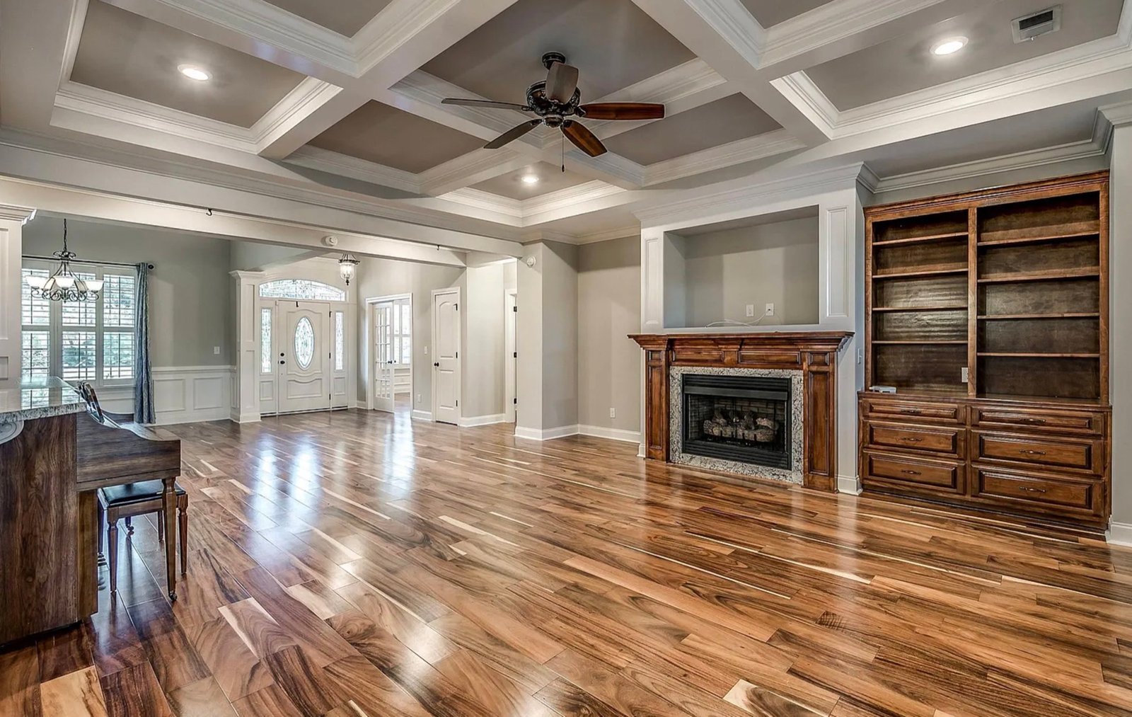 Great room with custom built-ins and fireplace at 1025 Muscovy